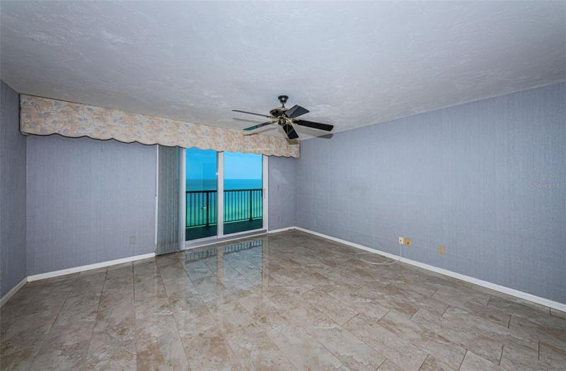 Primary Suite with Sliding Glass Door to the balcony