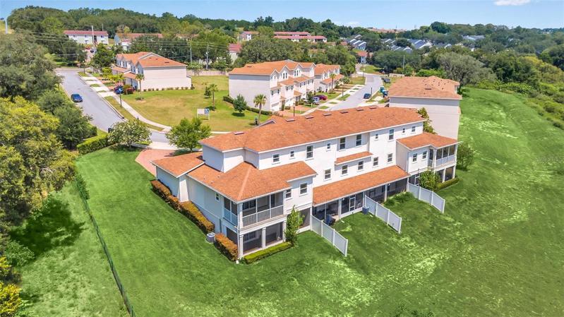 AERIAL VIEW OF THE BACK SIDE OF THE HOME