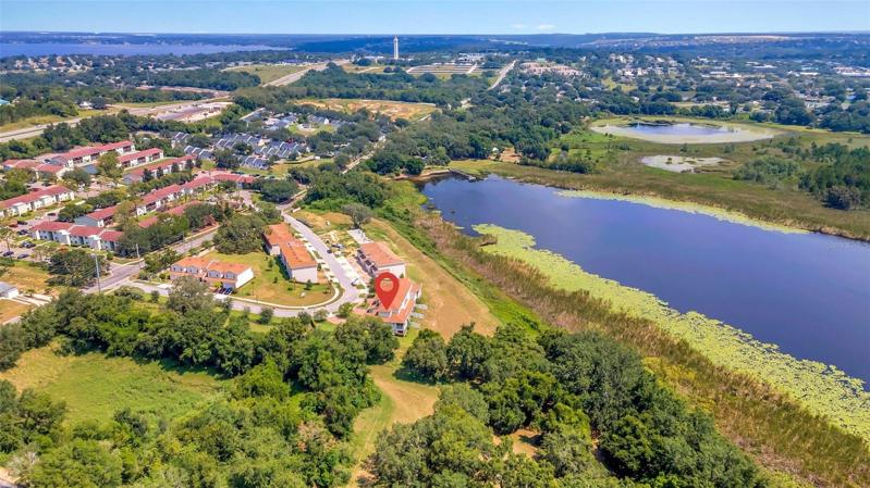 AERIAL VIEW OF THE TOWNHOME UNIT WITH PINNED LOCATION / VIEW OF JACK'S LAKE