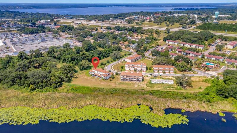 AERIAL VIEW OF THE TOWNHOME UNIT WITH PINNED LOCATION