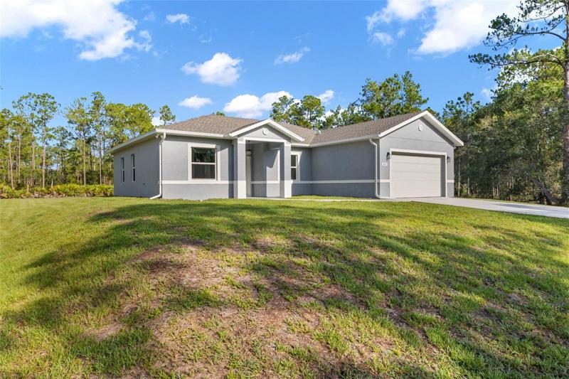 Front of Structure - Peaceful street - fully irrigated yard