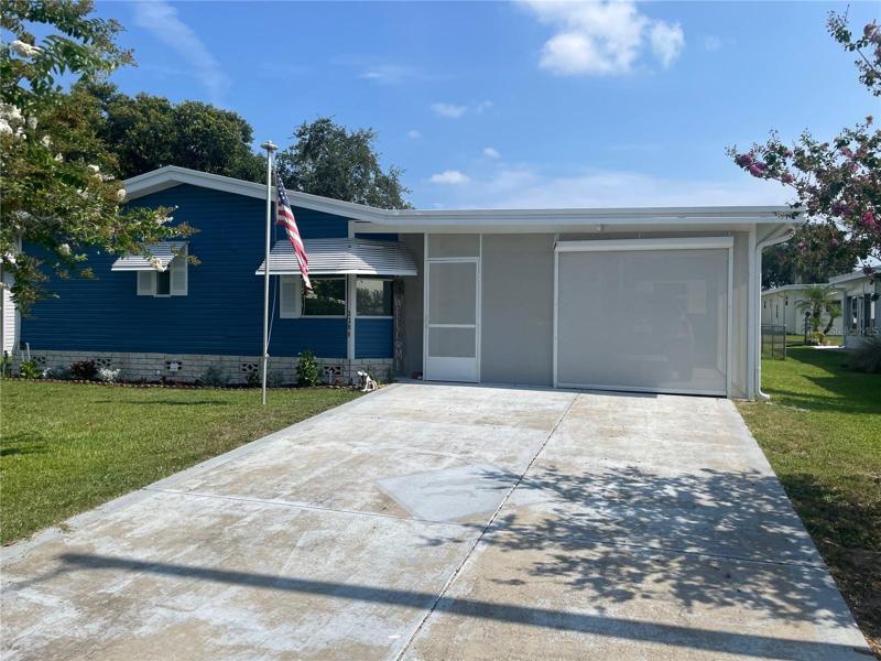 Screened carport