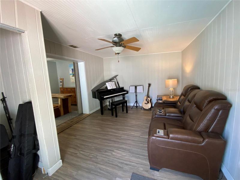 Bedroom 3 is used as a music room.
