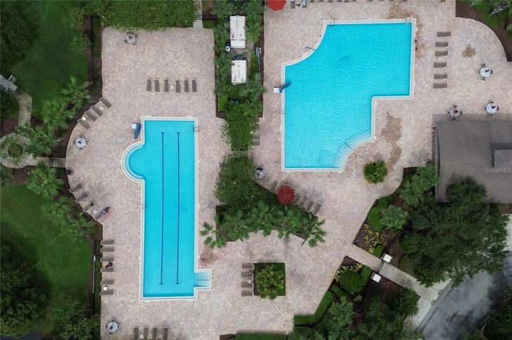 Great lap and swimming pools with plenty of lounge chairs and covered areas to enjoy.