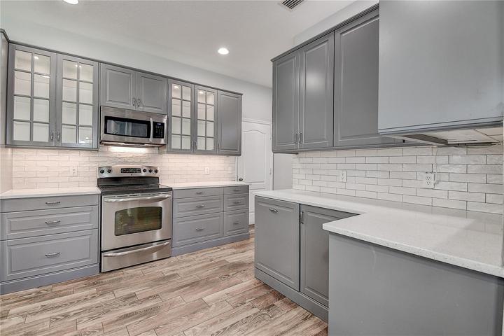 Kitchen has all the storage and counters you need.  Includes recessed light in and under cabinets.