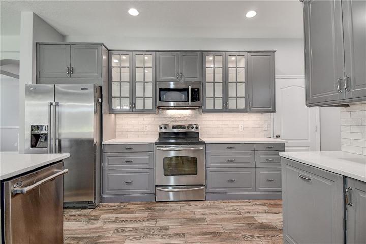 Plenty of clearance between the cabinets so the kitchen can handle more than one person in there at a time.