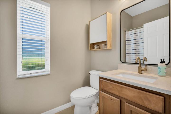 Upgraded bath 2, quartz countertop, new sink & faucet, mirror