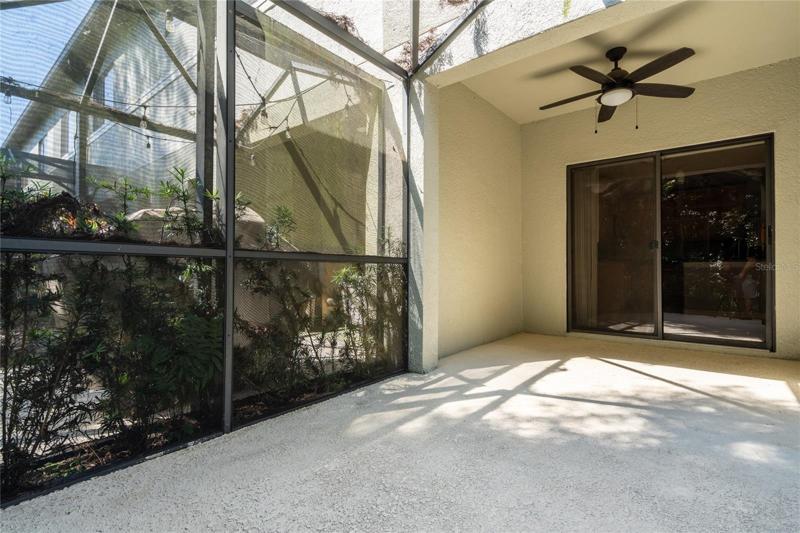 Rear screen room towards lanai and dining area.