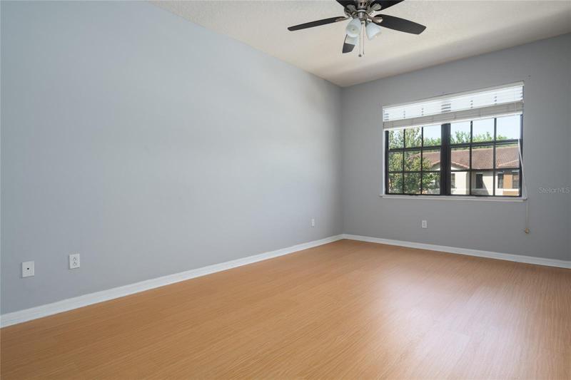 16 X 11 Owner's Suite. Private bath & walk-in closet immediate left.