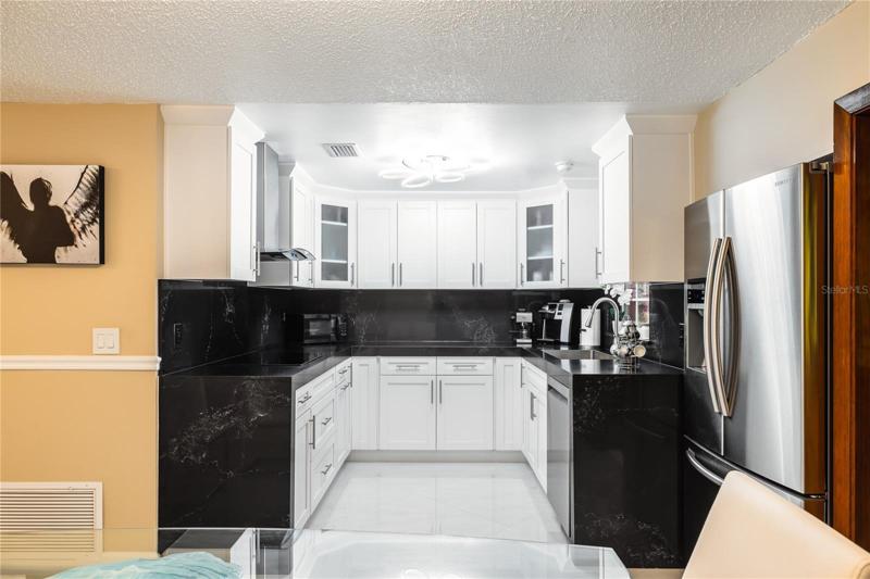 Kitchen, cabinets with glass doors, dishwasher single bowl sink
