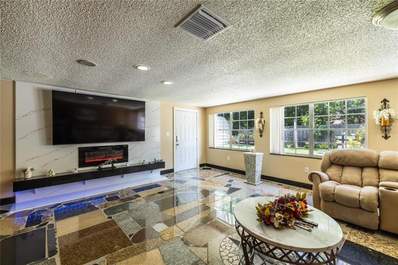 Family room entertainment. Electric fire place  with heat element.