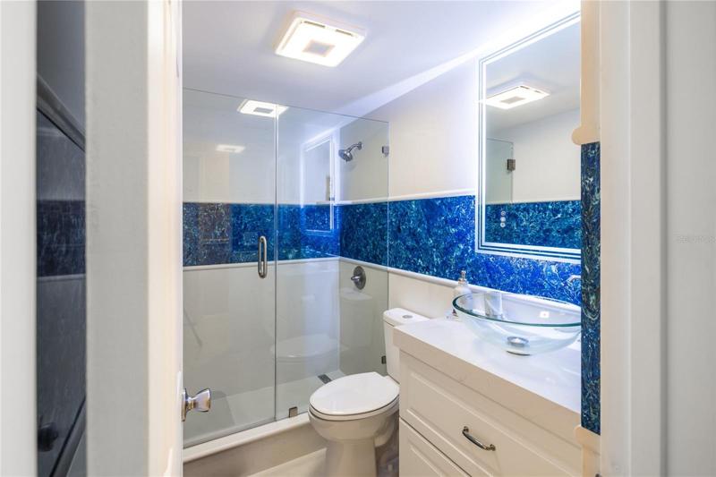 Master bathroom, quartz walls, modern look.