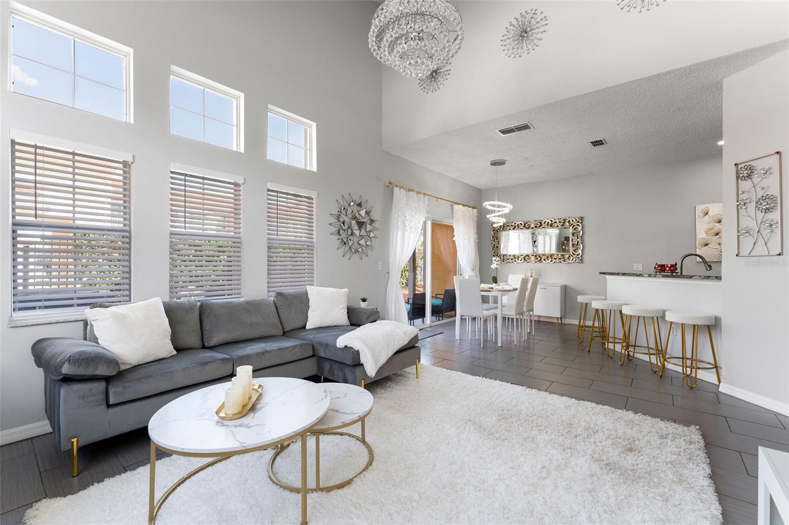 LIVING ROOM WITH VAULTED CEILING
