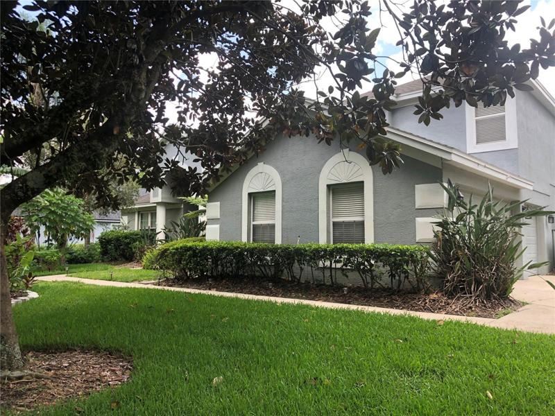 Welcome home to a tree lined street in a gated community with kind neighbors.