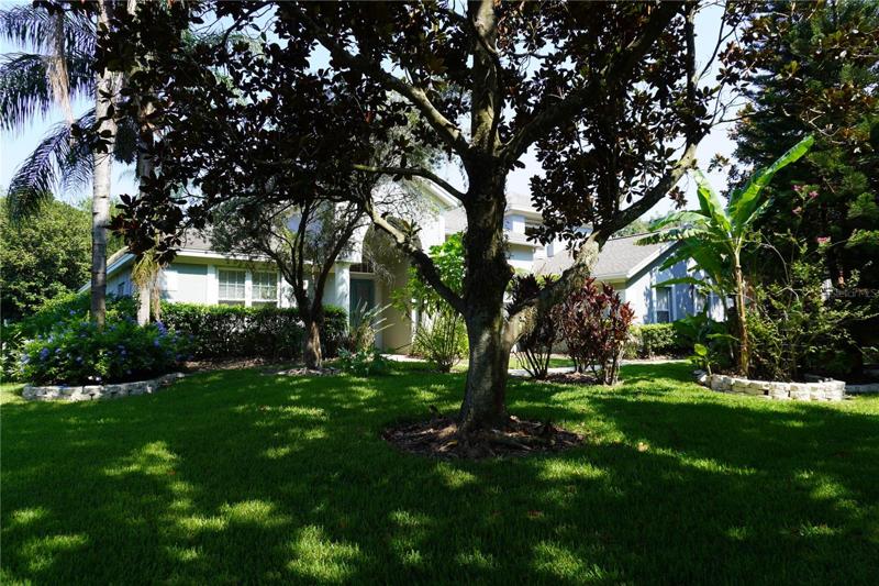 Drive the tree lined street of Seville Chase to your new home.