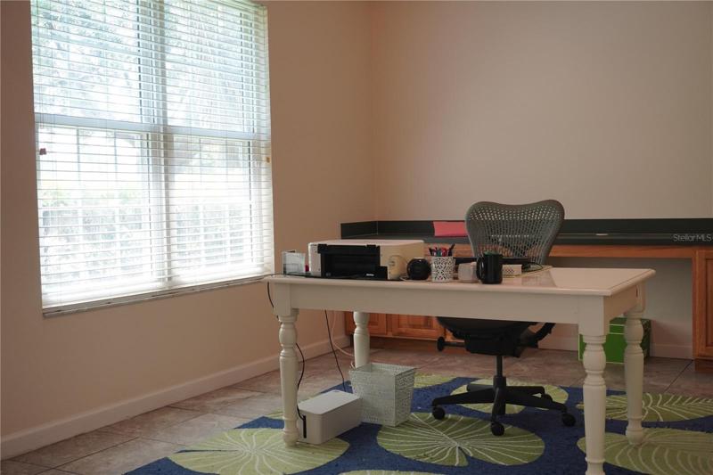 Enjoy the beautiful filtered light in your office situated just left of the front door.