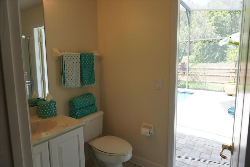 Bathroom 2 is the pool bath with full shower
