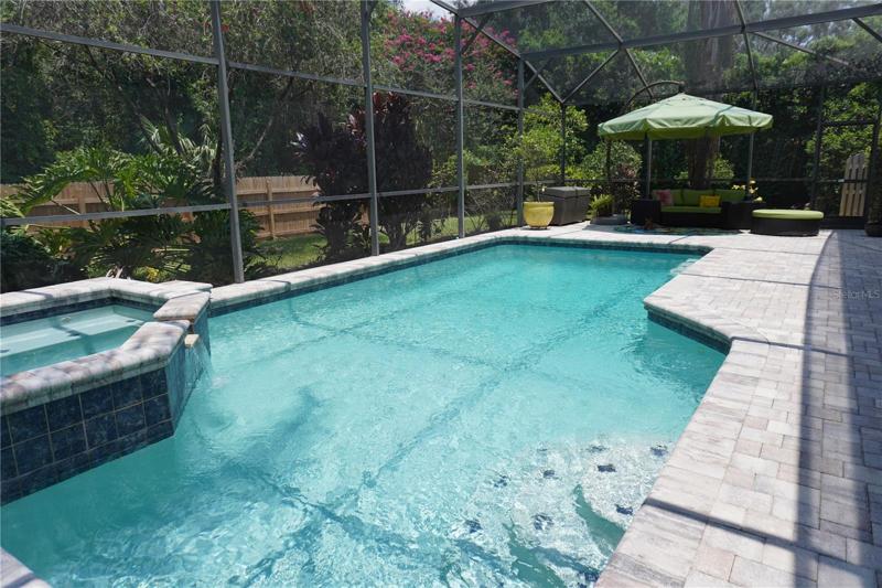 Cool off in your sparkling pool day or night.