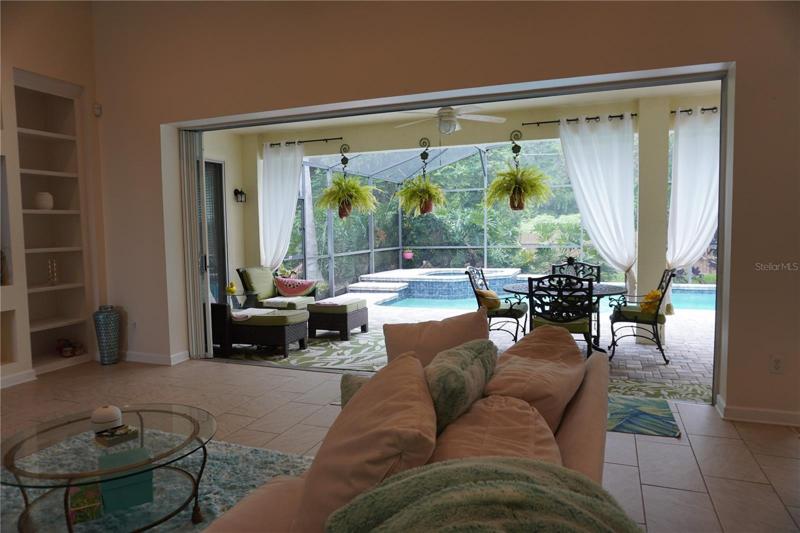 The 16 foot pocketing sliding glass door makes bringing the outdoors in a snap.