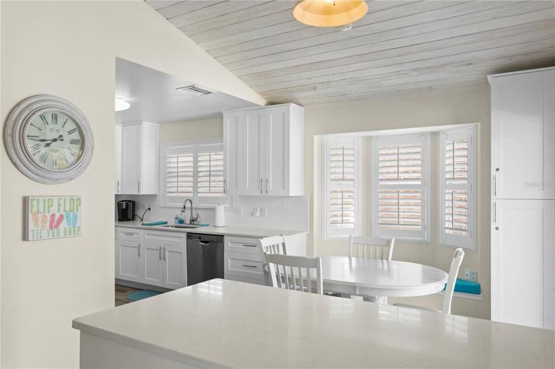 One of the entrances to the kitchen from the living room. This counter is ideal for holding snacks when entertaining.
