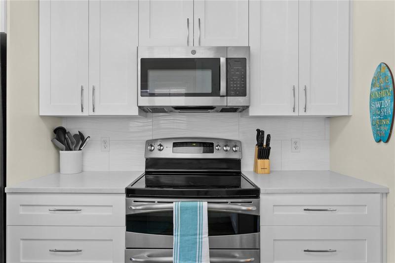 White shaker cabinets and the double oven.