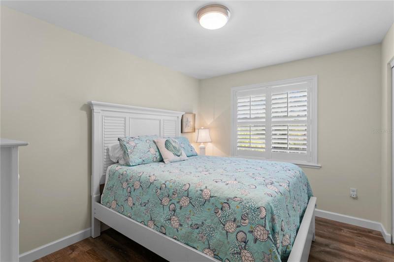 1st Bedroom when heading down the hall. This one is 9X12.