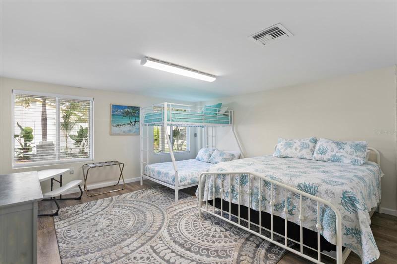 Bedroom # 4 is on the 1st level and set up for a family to stay, 2 double beds and a bunk, what fun! This room is 14X15.