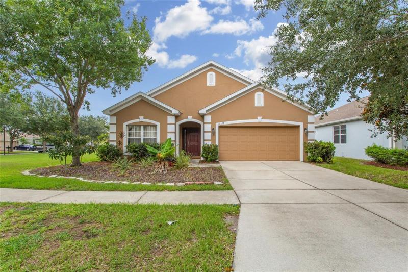 LARGE CORNER LOT W/POND VIEWS!