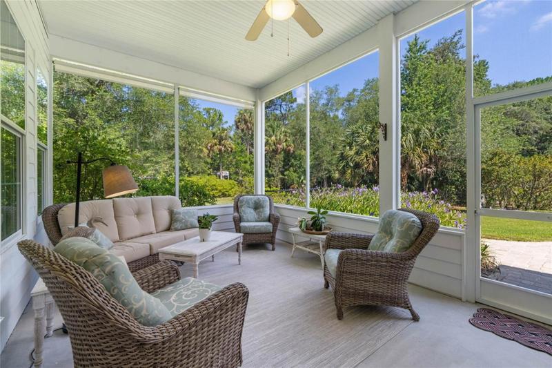 Sreened-in Florida room next to great room