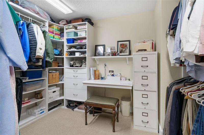 Master bedroom walk-in with built-in desk
