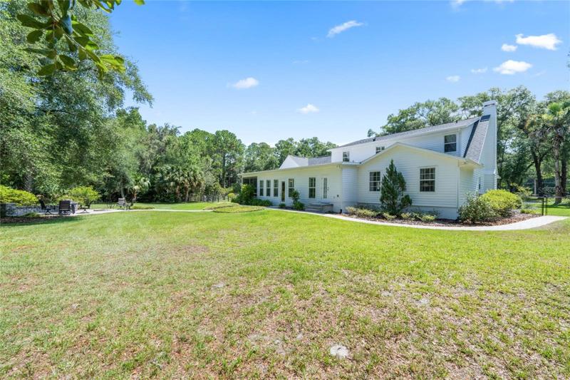 Side of property with fire pit