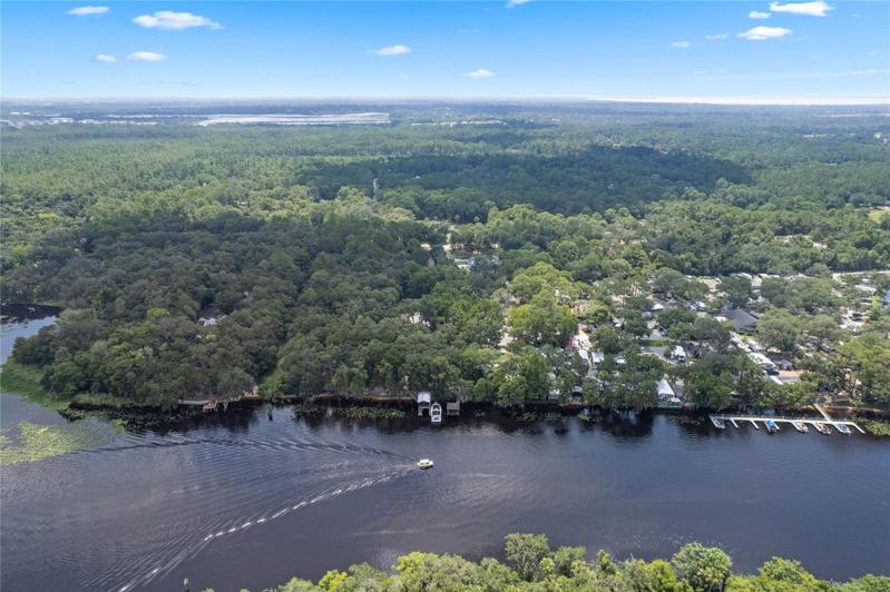 Aerial view of private community dock and ramp