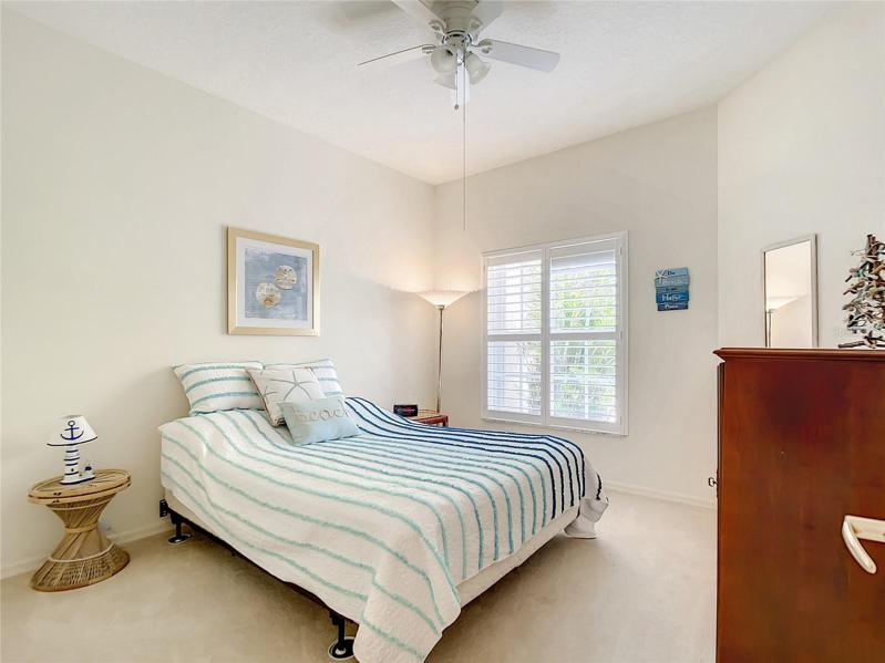 Bedroom #2. Large Windows for plenty of light and Custom Plantation Shutters