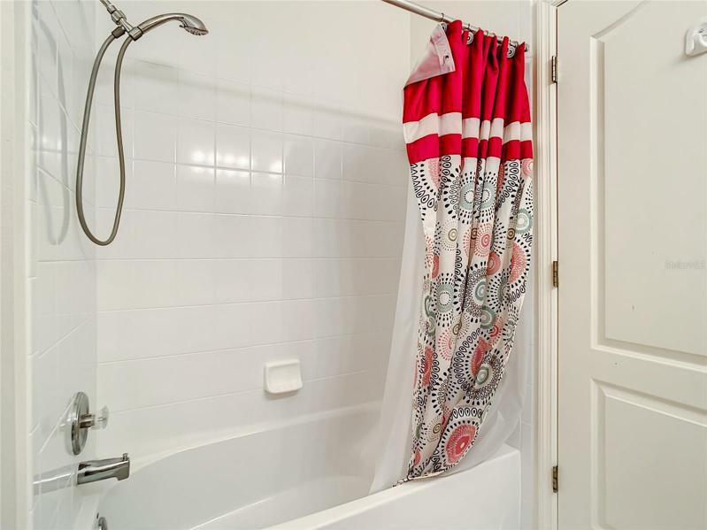 Guest Bath features a Tub/Shower combination