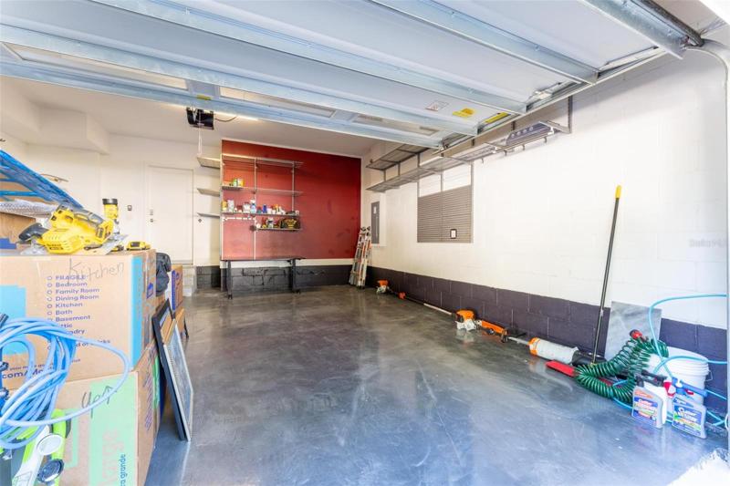 Custom Garage Epoxy Flooring and Shelving Units