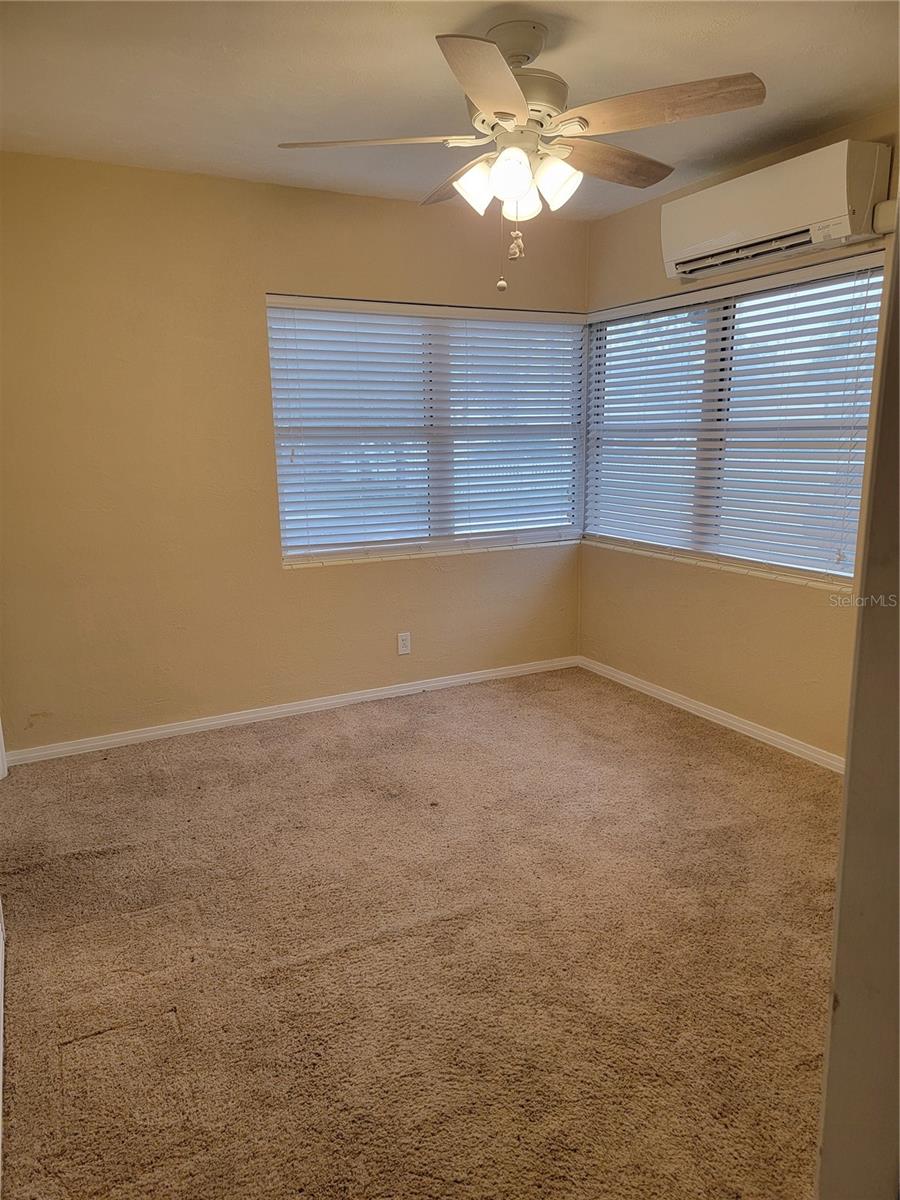 Bedroom 2, there is also wood floors under the carpet