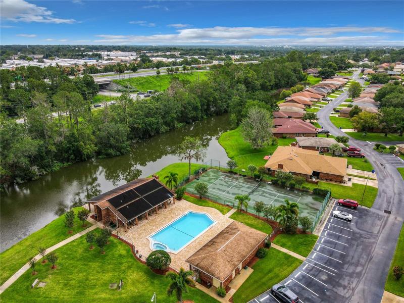 View of community pool/tennis courts/clubhouse