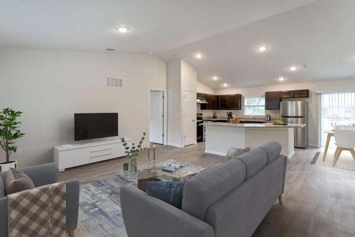 Staged Model Home, Living Room with kitchen/dining view