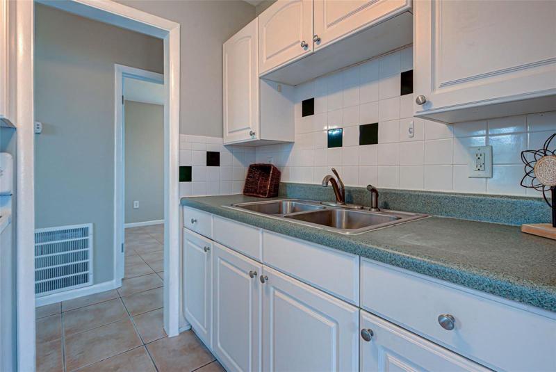 Kitchen toward hall to bedroom