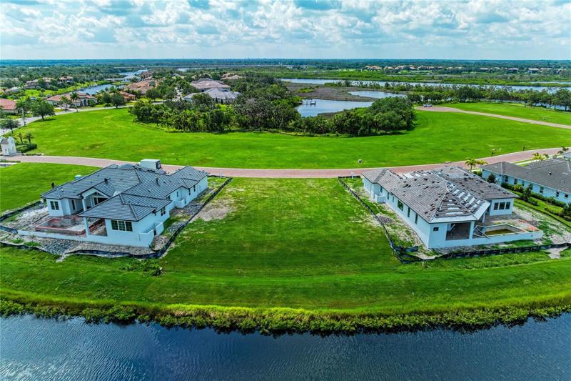 2 John Cannon Homes underway bookending lot 76