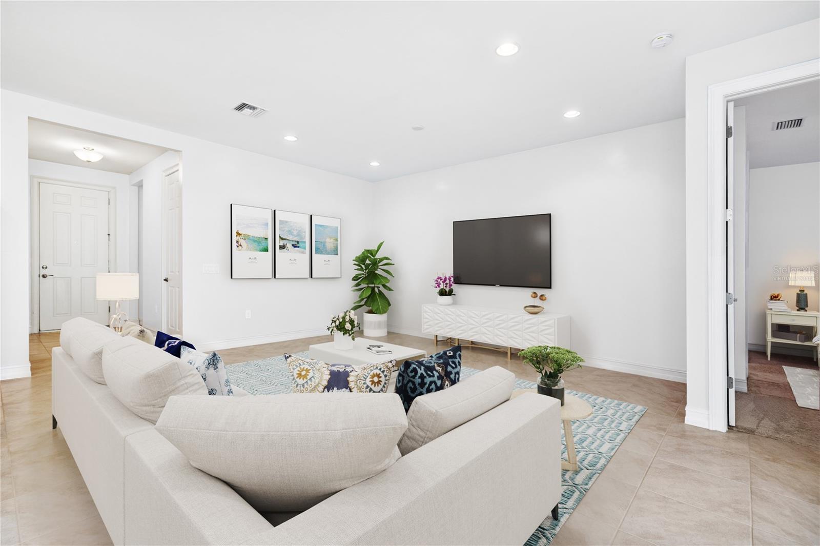 virtually staged living room with wall color changed to neutral color