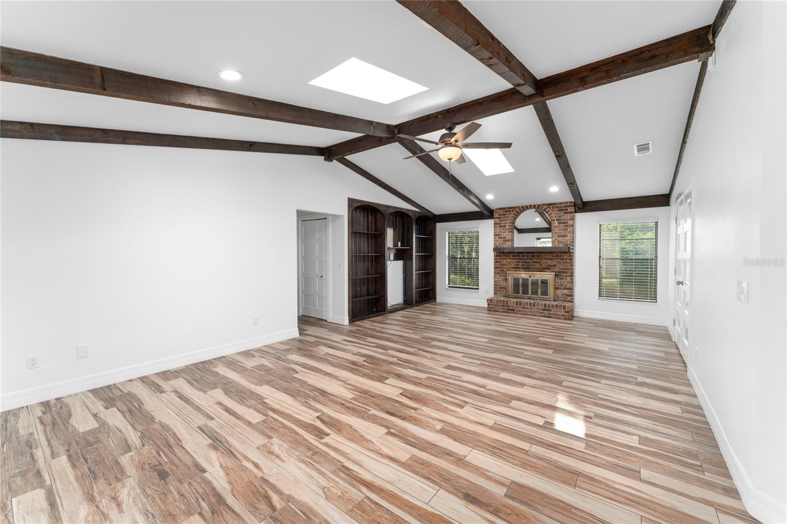 This view shows the wood burning fireplace.