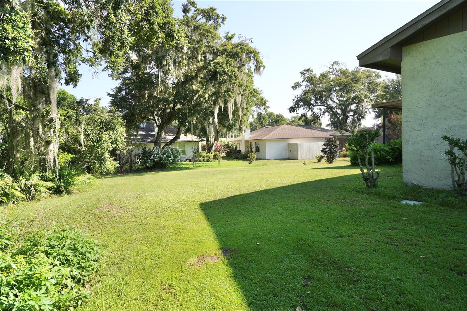 View of backyard from side of house