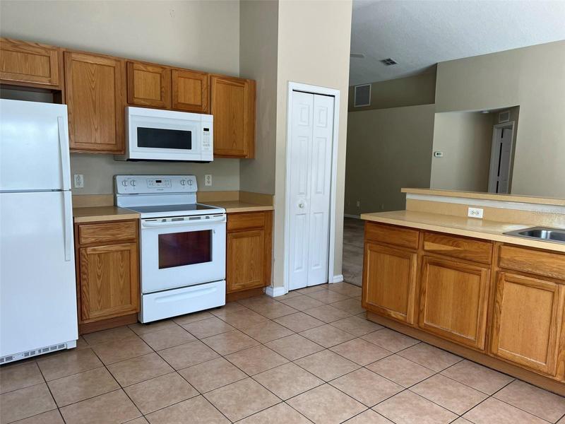 Open kitchen with eating area.