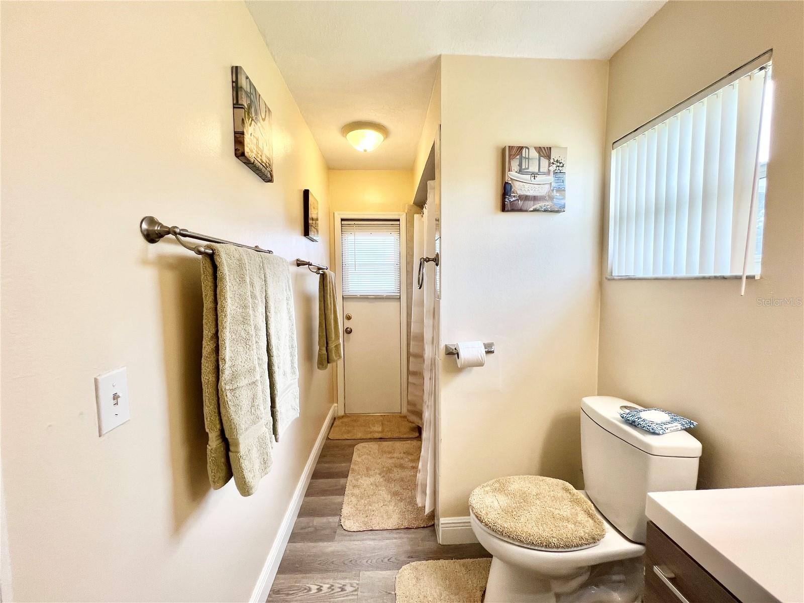 2nd bathroom leading to pool.