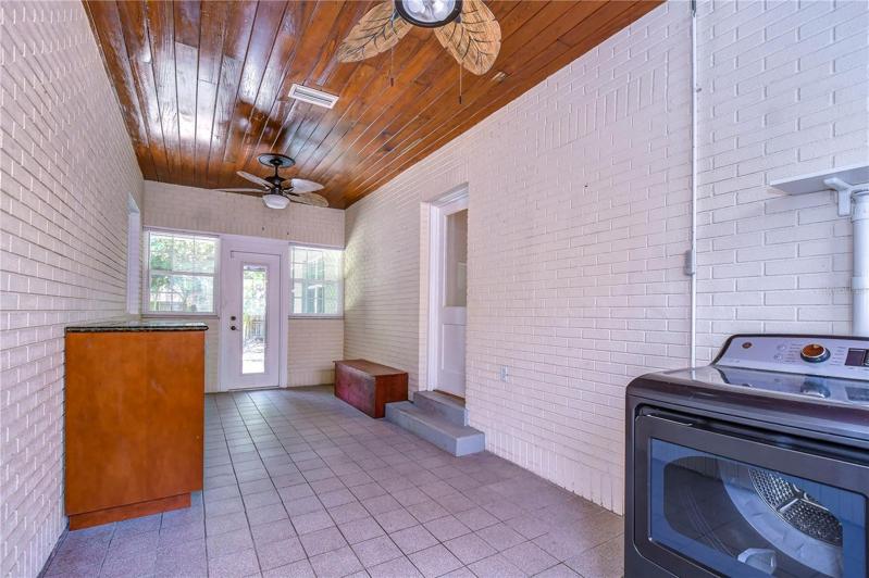 Laundry area/bonus/flex space leads to garage