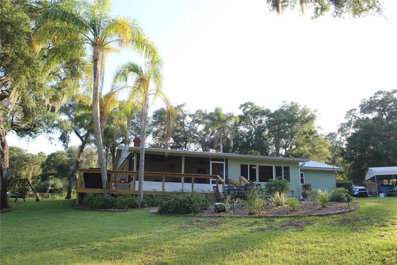 Rear view of deck and porch from lake