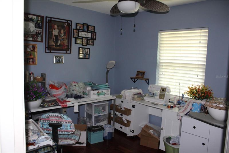 Bedroom 3 used as craft room.
