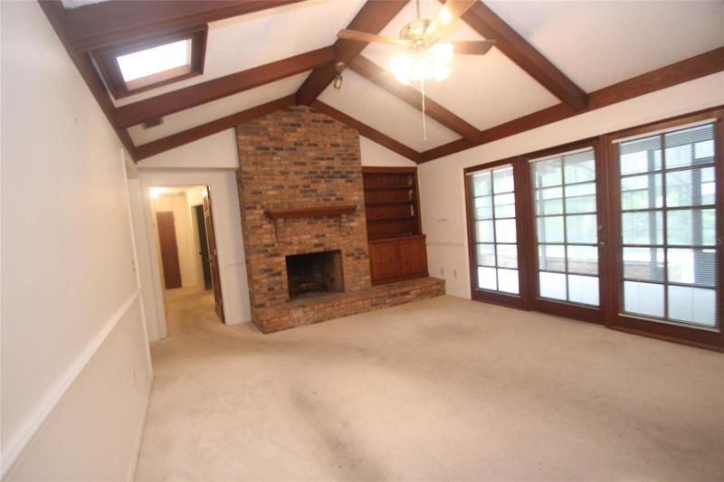 Family room with french doors leading to the lanai