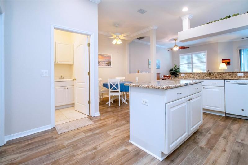 Kitchen, center island, laundry room, eat-in nook and out to dining room